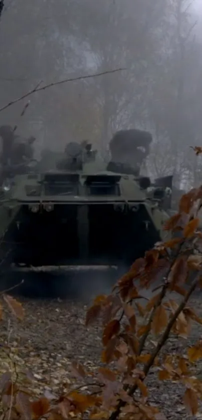 A camouflaged tank in a misty forest with autumn leaves.