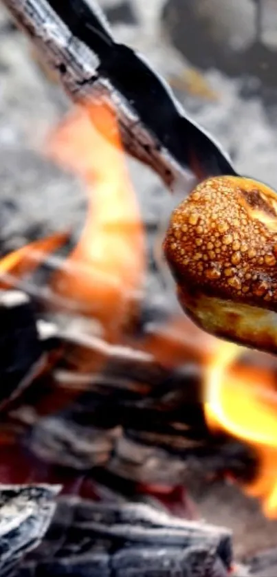 A golden delicacy roasting over a lively campfire, with bright orange flames.