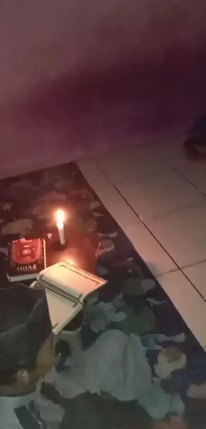 Candlelit reading on a traditional carpet at night.