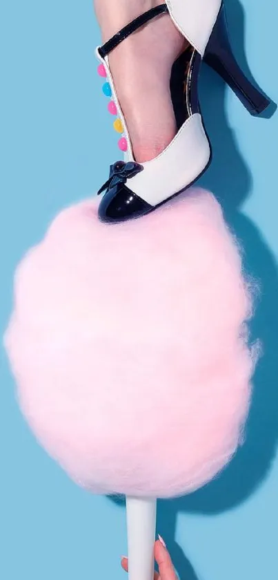 High heel on cotton candy with blue backdrop.