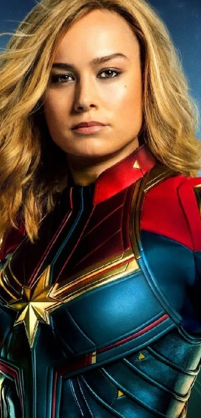 Captain Marvel in her iconic suit on a mobile wallpaper.