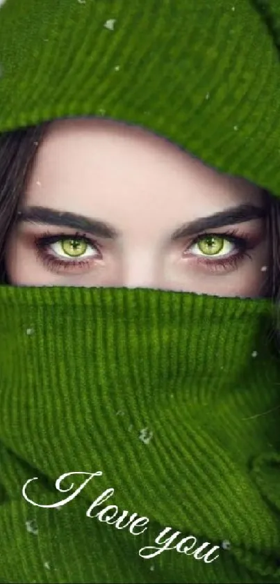 Stunning mobile wallpaper with green eyes peeping through a green scarf.