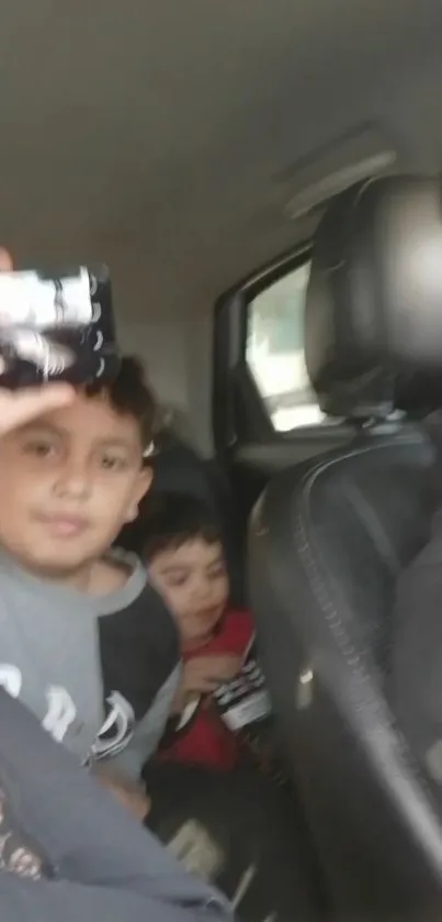 Kids inside a car during a family trip, offering a warm and cozy view.