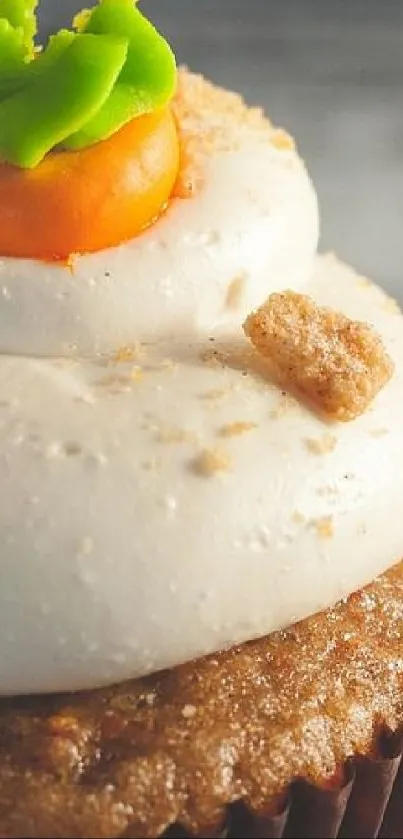 Close-up of carrot cupcake with frosting.