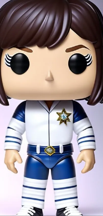 Cartoon vinyl figure in blue and white outfit with dark hair.