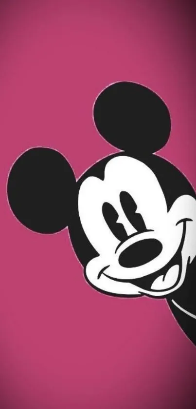 Cartoon mouse peeking with magenta background.