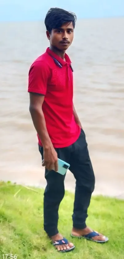 Casual portrait of a young man by the ocean