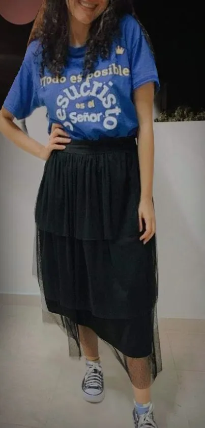 Casual outfit with blue tee and black skirt, perfect for stylish inspirations.