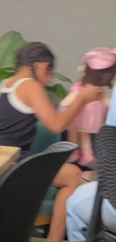 Casual indoor family moment by a table.