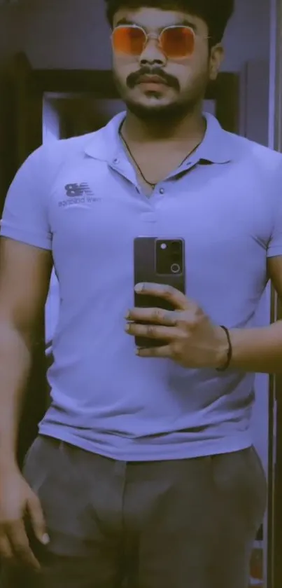 Mirror selfie with casual blue aesthetic in modern style.