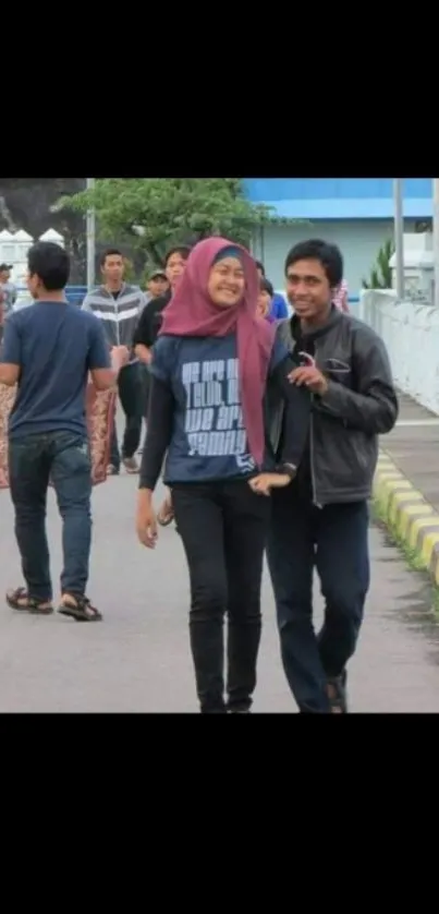 A couple enjoying a walk outdoors, friendly and casual.