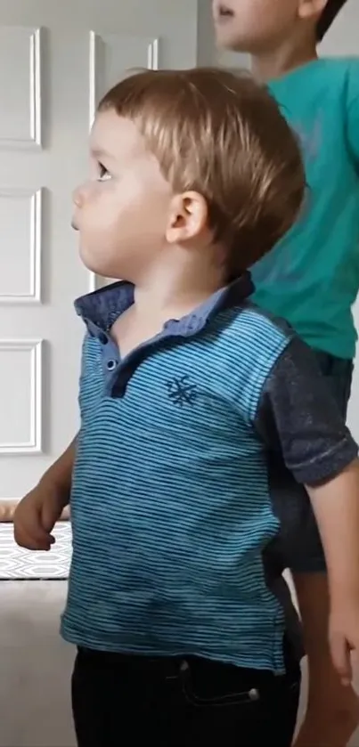 Young toddler plays in a light-filled room.