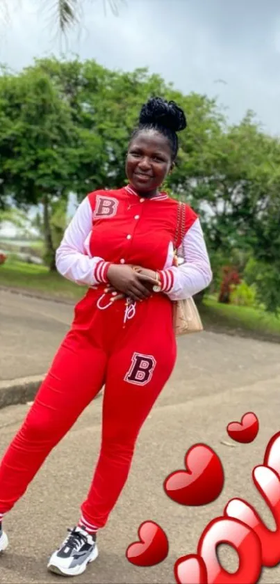 Casual stroll in a scenic park with vibrant red outfit.