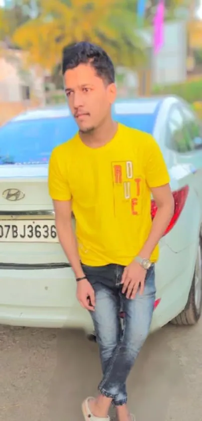 Person in yellow shirt leaning on a Hyundai car in a vibrant street scene.