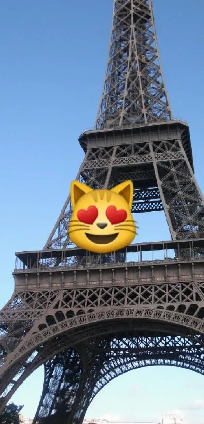 Eiffel Tower with heart-eyed cat emoji on a clear day.