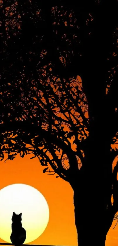 Cat silhouette against an orange sunset with a tree in the foreground.