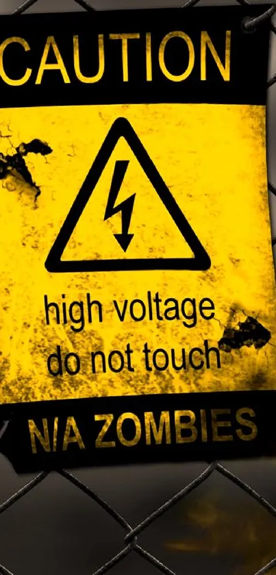 Yellow caution sign with zombie theme on chain fence.