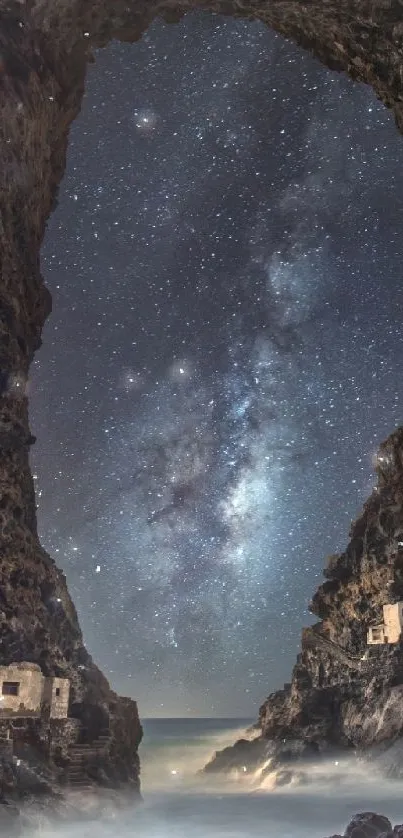 Cave opening framing a starry night sky and Milky Way over water.