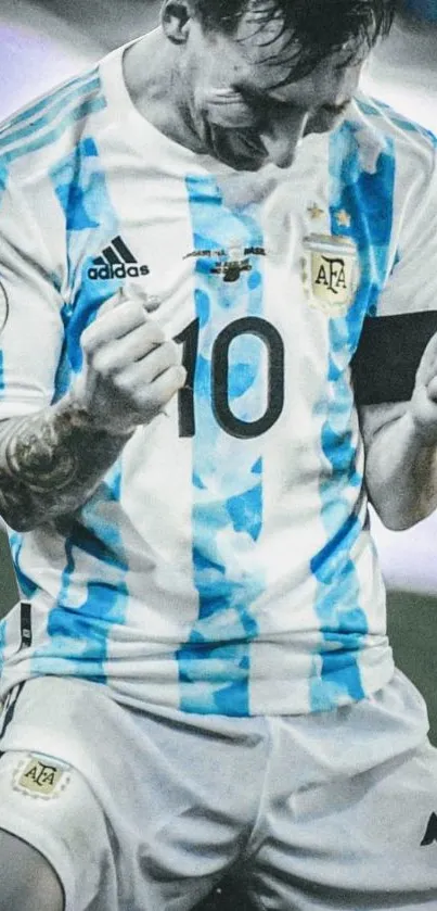 Soccer player celebrating victory in bright team jersey.