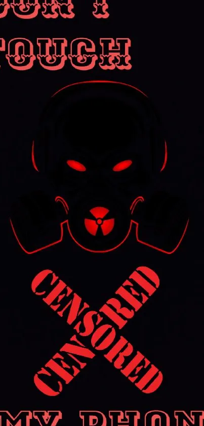 Dark wallpaper with a red censored gas mask graphic and text.