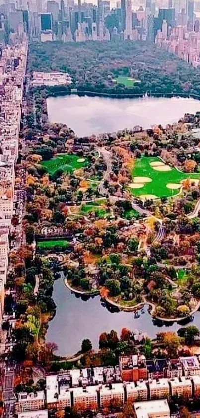 Aerial view of Central Park with city skyline and greenery.