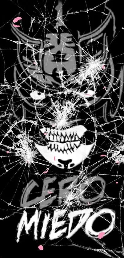 Image of a bold, masked figure with shattered glass effect and 'Cero Miedo' text.