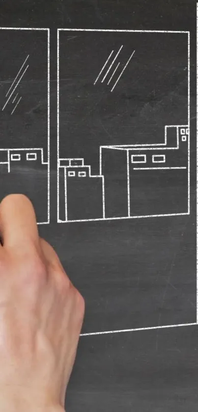 Hand erasing chalk cityscape on a chalkboard for mobile wallpaper.