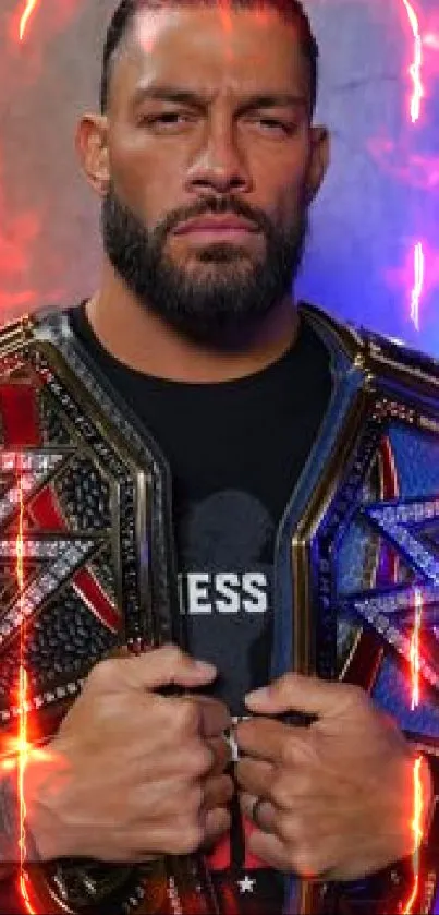 Champion holding dual belts with a dark blue backdrop.