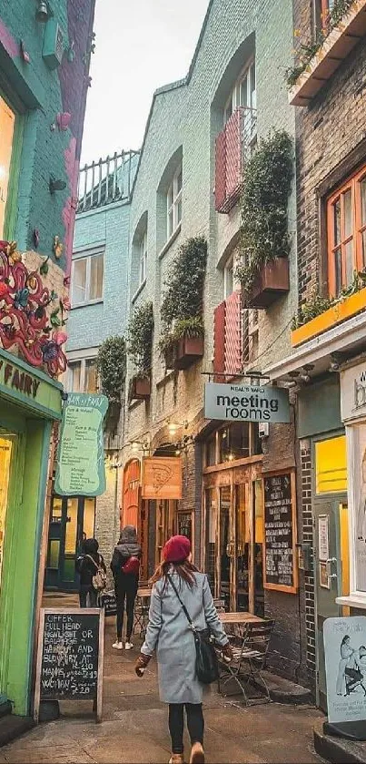 Vibrant alleyway with colorful shopfronts and street view.