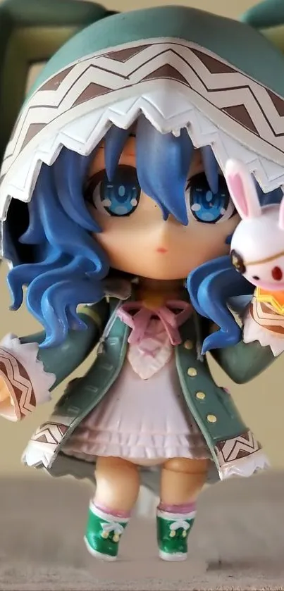 Charming anime figurine with blue hair and a green outfit holding a pink bunny toy.