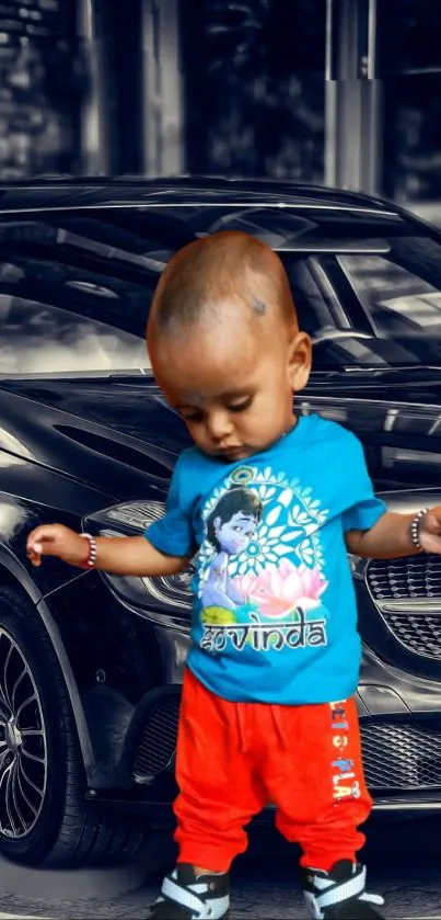 Baby stands confidently in front of a luxury black car wearing a colorful outfit.