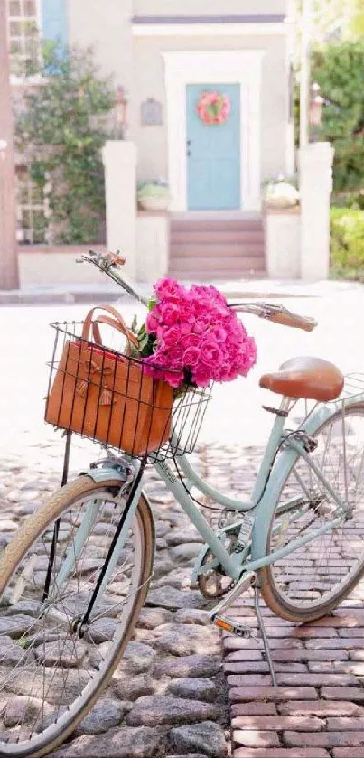 Vintage bicycle with pink roses on a sunny stone path.