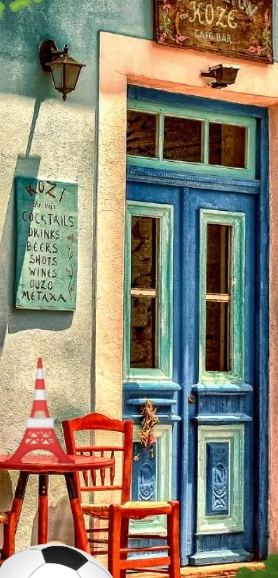 Vibrant blue cafe doorway with red chairs and whimsical decor.