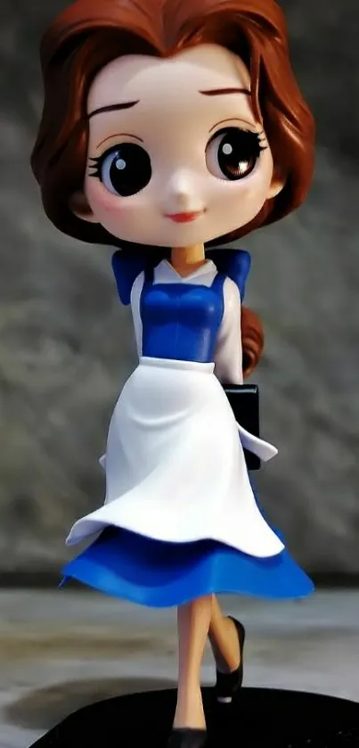 Cute cartoon-style figurine with a blue dress and white apron on a gray background.