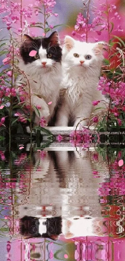 Two cute kittens among pink flowers with water reflection.