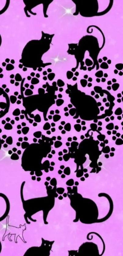 Pink wallpaper with black cat silhouettes forming a heart.