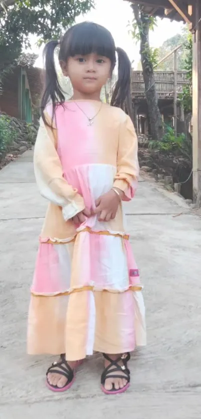 Charming young girl on a serene nature walk with pastel dress.