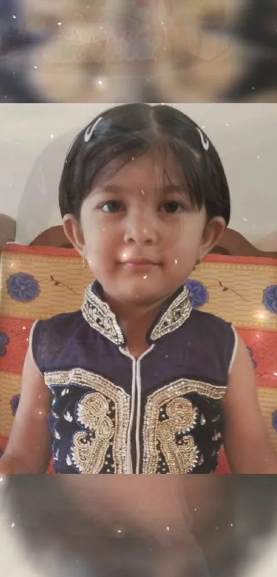 Portrait of a child in traditional attire with a warm beige background.