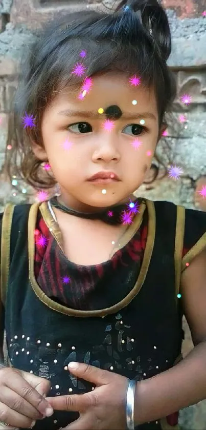 Charming child portrait with sparkles and a rustic background.