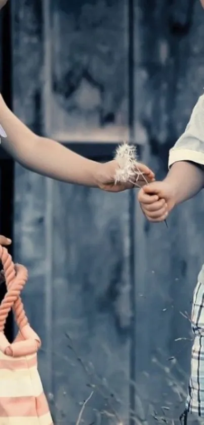 Children sharing dandelions against a vintage blue backdrop.