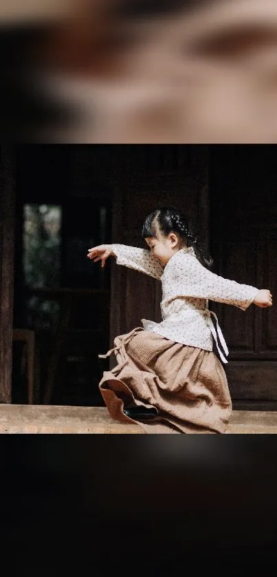 Child playing in vintage attire on a rustic background.