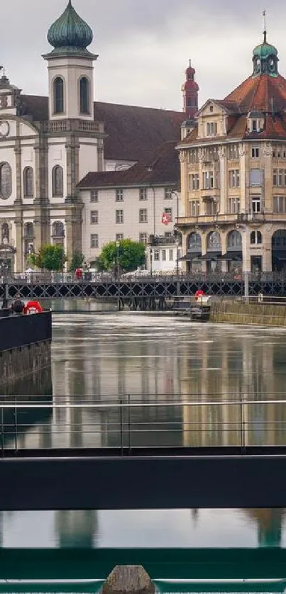 Charming cityscape with river reflections and historic architecture.