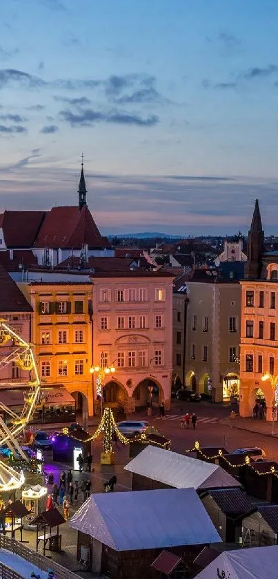 Charming European market at night with illuminated architecture.