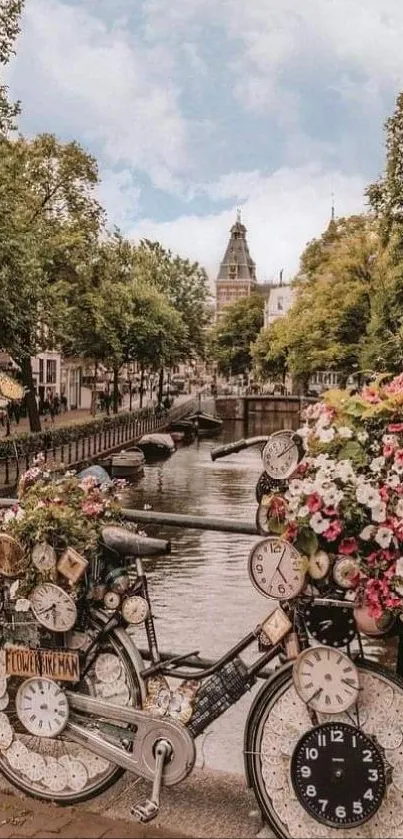 Bicycle with clocks and flowers by a serene canal in an urban setting.