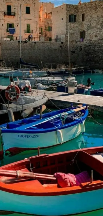 Scenic harbor with colorful boats and historic stone buildings.