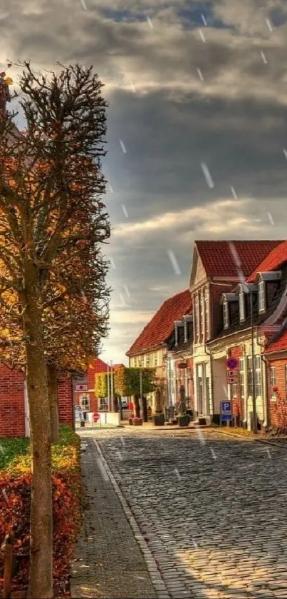 Charming cobblestone street with autumn hues and rustic buildings.