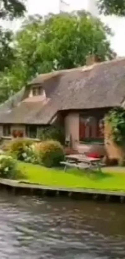 Riverside cottage amidst lush greenery and calm waters.