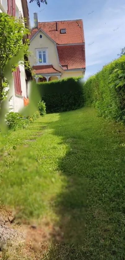 Charming garden path leading to a rustic cottage with lush greenery.