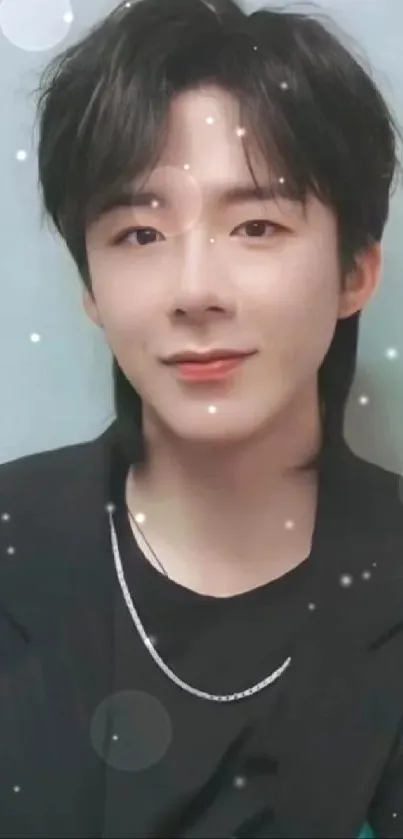 Stylish dark-haired person on a gray background.