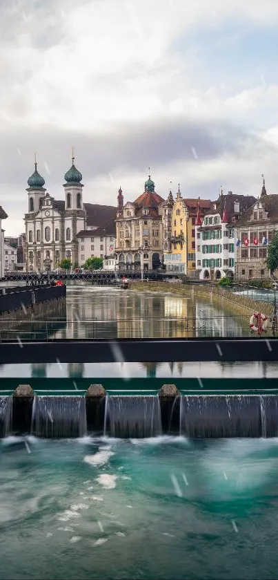 Picturesque riverfront European town wallpaper with historical architecture.